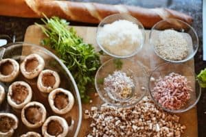 Ingredients ready to prepare stuffed mushrooms